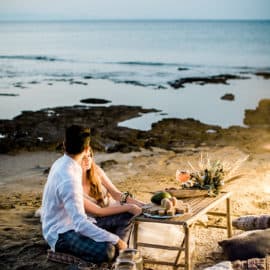 wedding photography bride and groom have a cocktail at the beach