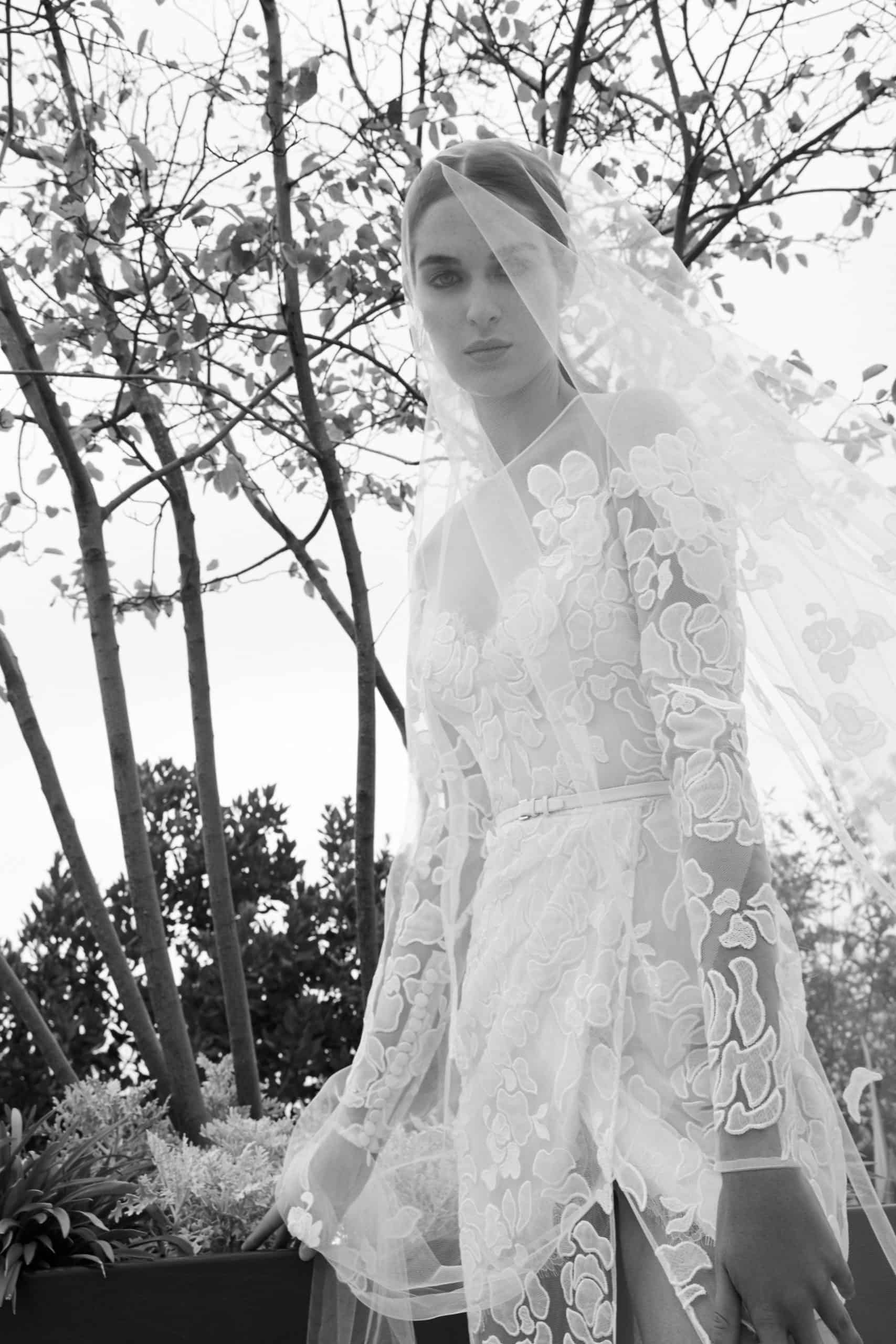 lace wedding dress with veil by Elie Saab