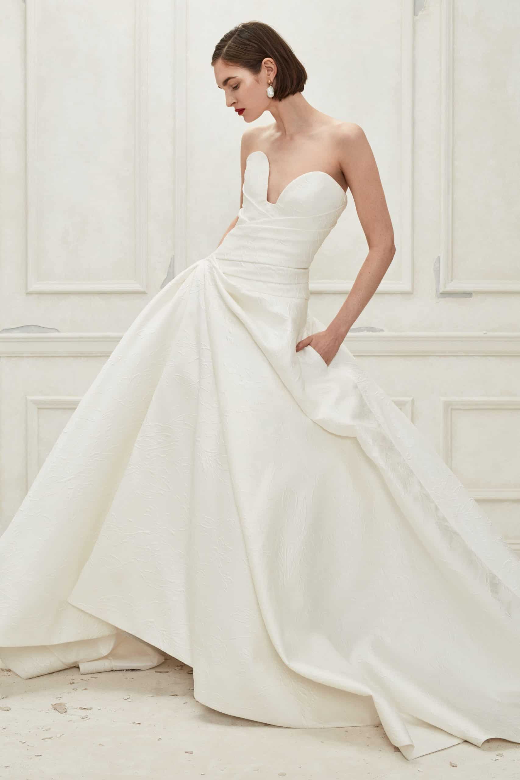 strapless a line silk wedding dress by Oscar de la Renta