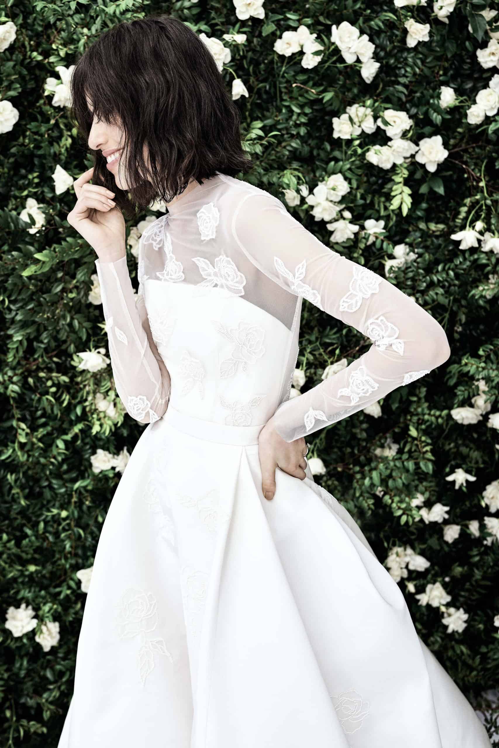 wedding dress with see-through sleeves by Carolina Herrera