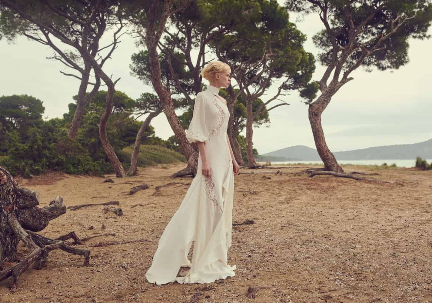 wedding dress with lace and long sleeves by Costarellos