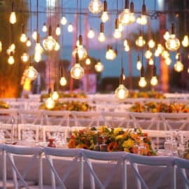 Freeform lightbulbs over wedding tables, designed by Kisomi Lighting.
