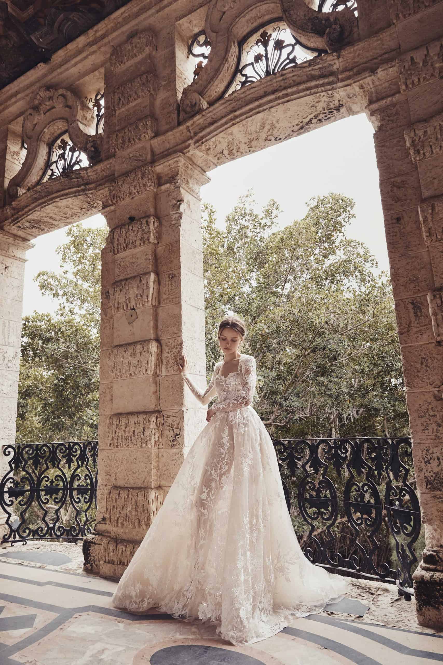 wedding dress with see-through tulle with lace by Monique Lhuillier