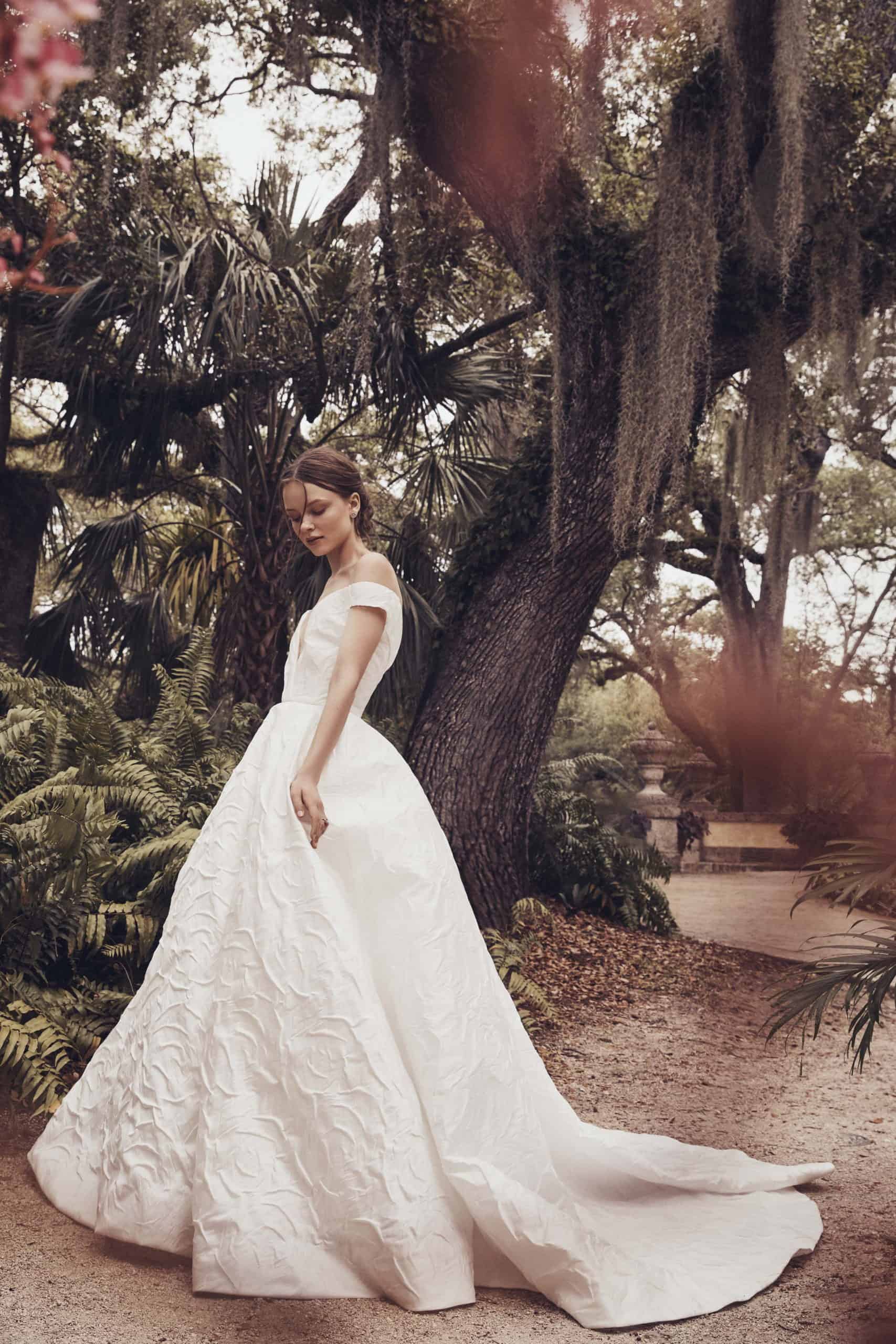 a-lined wedding dress with heavy lace by Monique Lhuillier