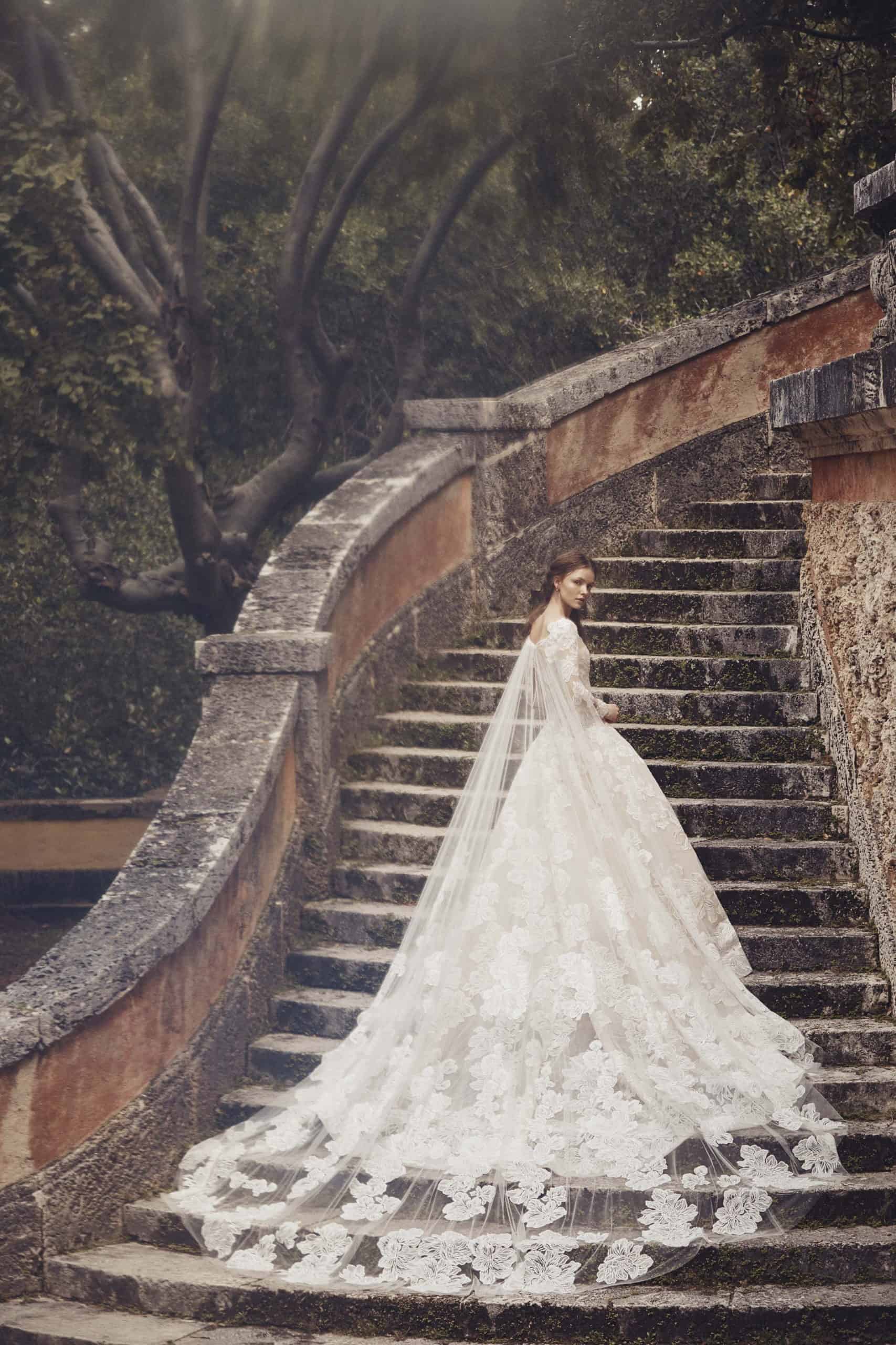 a-lined wedding dress with a laced cape by Monique Lhuillier