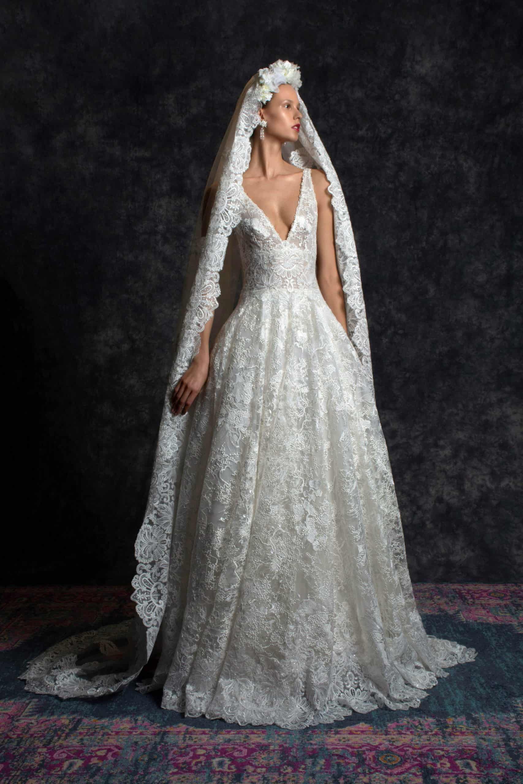 classic lased a-line wedding dress with a veil by Naeem Khan
