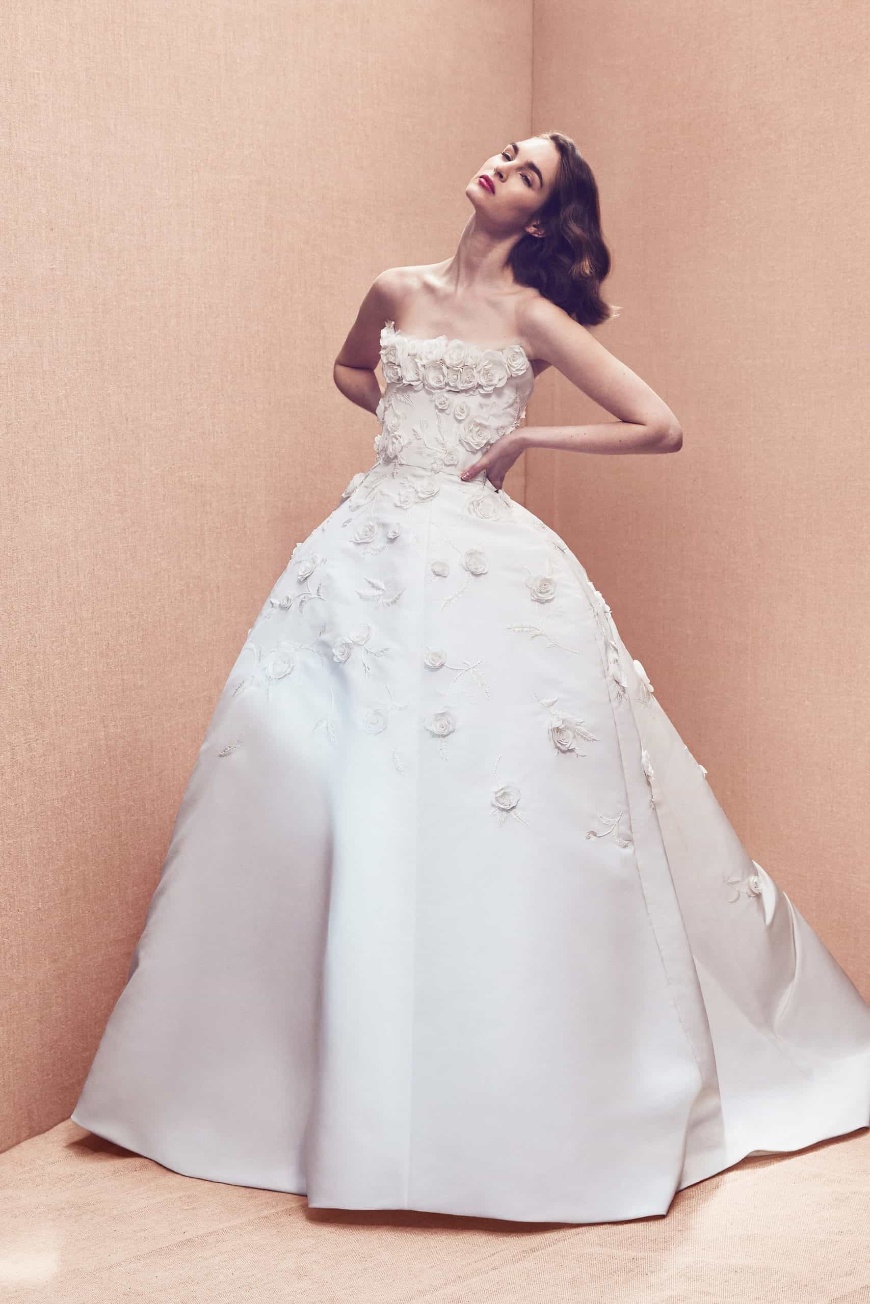 a-line strapless wedding dress with embossed flower by Oscar de la Renta