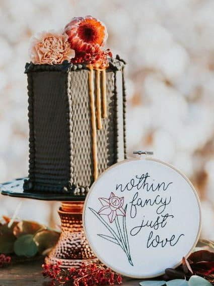 geometric grey wedding cake with flowers