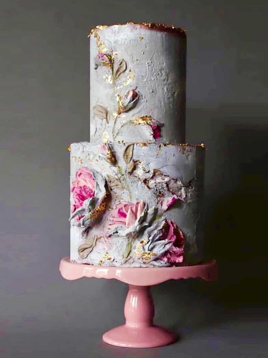 flower painted and concrete texture wedding cake